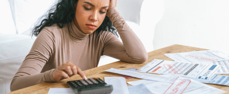 Stressed young woman has financial problems with credit card debt to pay crucial show concept of bad personal money and mortgage pay management crisis. sad and unhappy